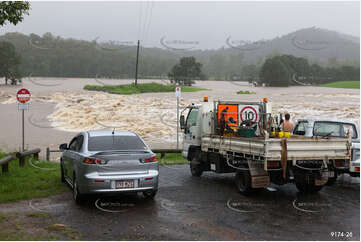 Flooded Road with 4WD QLD Aerial Photography